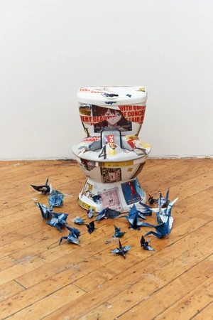 Paige K. Bradley, Landing Pad, 2024. Found object with plastic, paper, and muslin in acrylic with paper and acrylic collage. 15 x 10 3/4 x 15 in. (receptacle), dimensions variable overall.